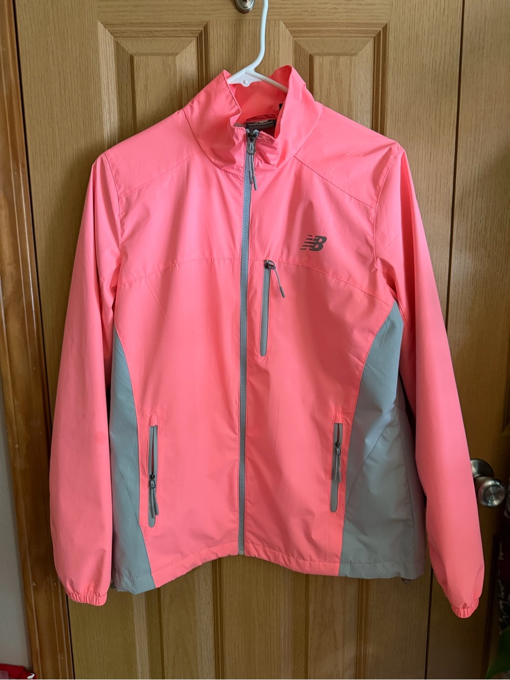 New Balance Women’s Lightweight Rain Jacket Neon Coral Pink | Size Large